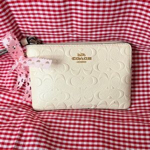Coach Cream Embossed Clutch